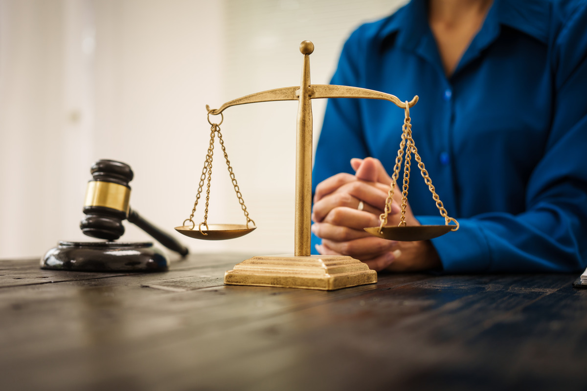 Lawyer with gavel and scales of justice