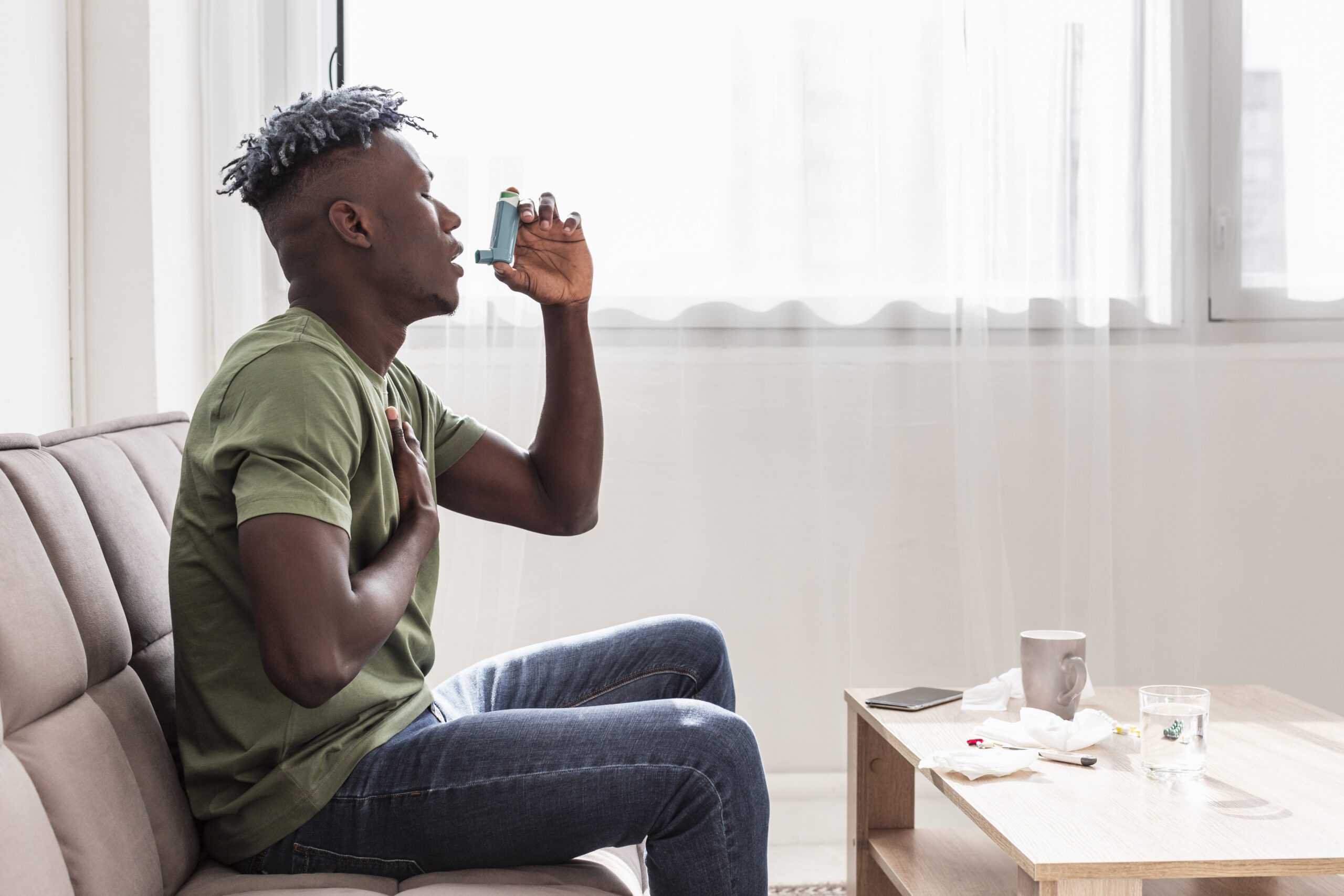 Dramatic night photo of a bright, glowing lightning bolt striking a tree in a forest clearing, illustrating the power of a thunderstorm